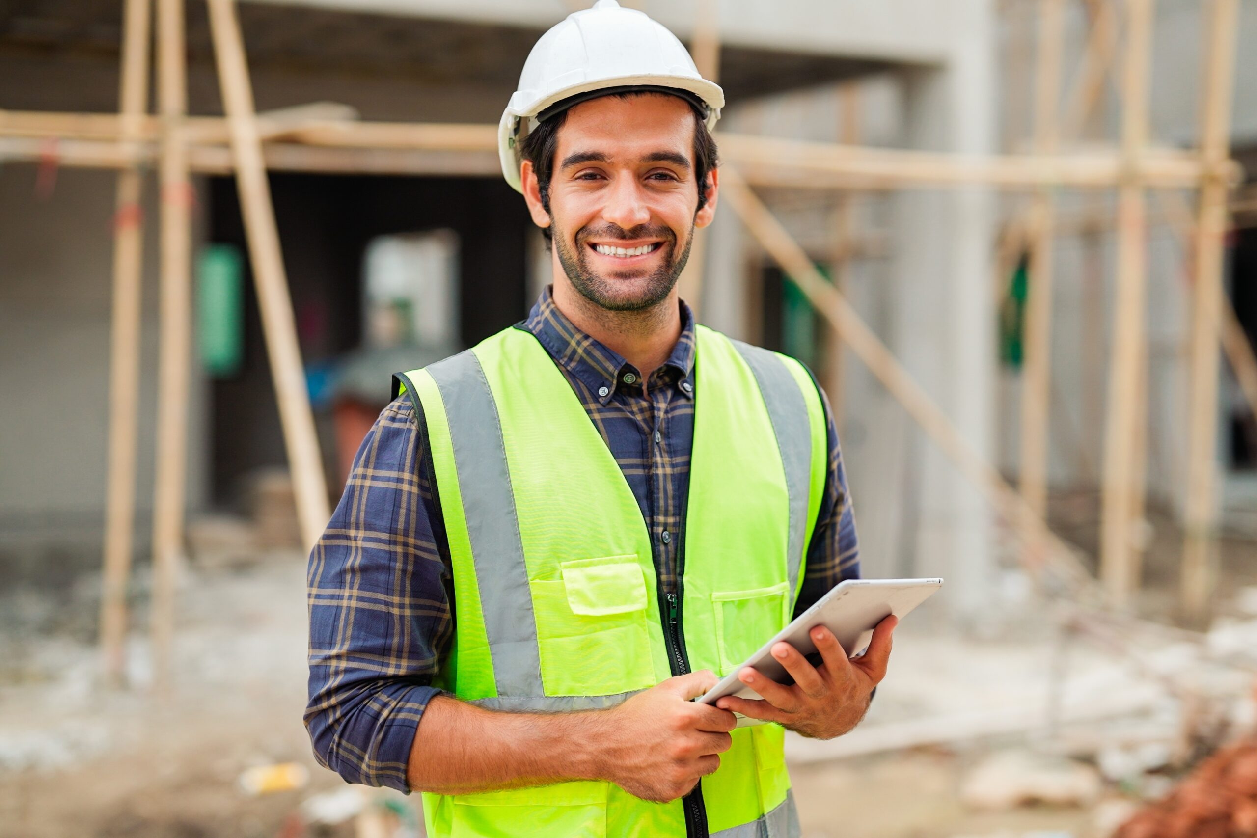 Portrait,Of,Cvil,Engineer,With,Safety,Uniform,Working,At,Construction