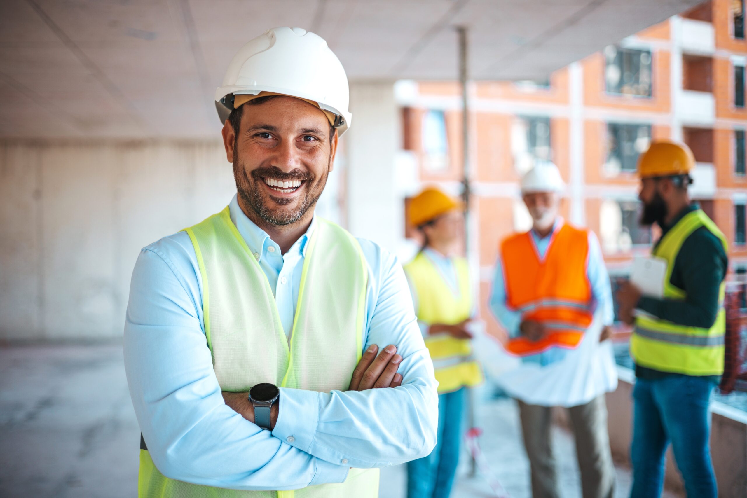Portrait,Of,Satisfied,Construction,Site,Manager,Wearing,Safety,Vest,And